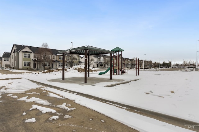 view of snow covered playground