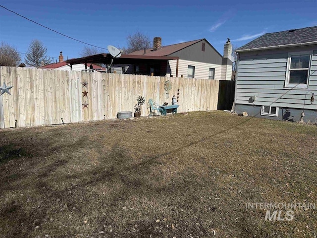 view of yard featuring fence