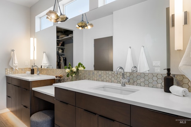 4213 E Divide Pass St, Meridian, ID 83642 - full bathroom with vanity, backsplash, and a walk in closet