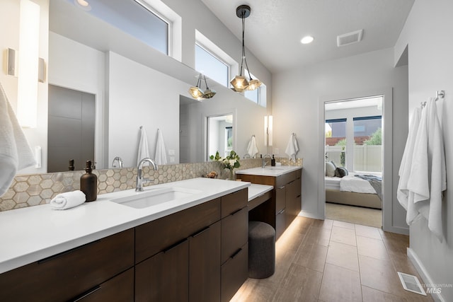 4213 E Divide Pass St, Meridian, ID 83642 - bathroom featuring plenty of natural light, vanity, ensuite bathroom, recessed lighting, and tasteful backsplash