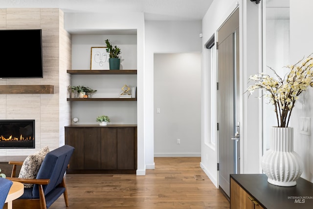 4213 E Divide Pass St, Meridian, ID 83642 - interior space with wood finished floors and a fireplace
