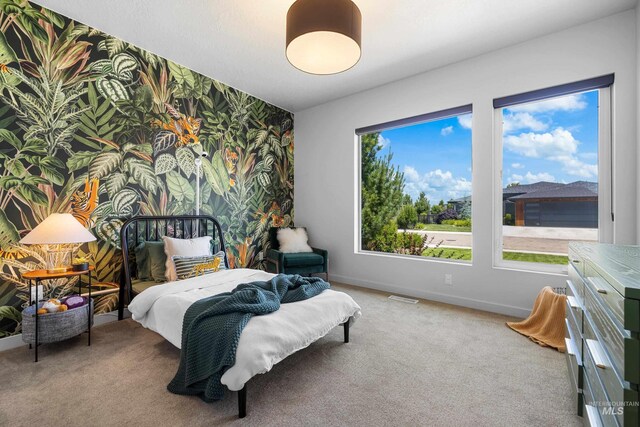 4213 E Divide Pass St, Meridian, ID 83642 - carpeted bedroom featuring wallpapered walls and an accent wall