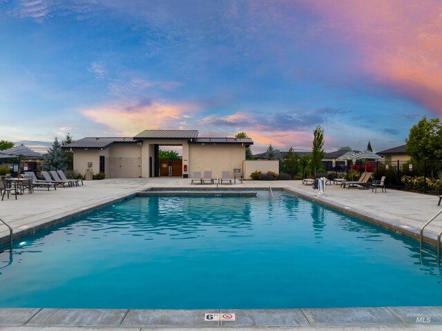 4213 E Divide Pass St, Meridian, ID 83642 - community pool with a patio