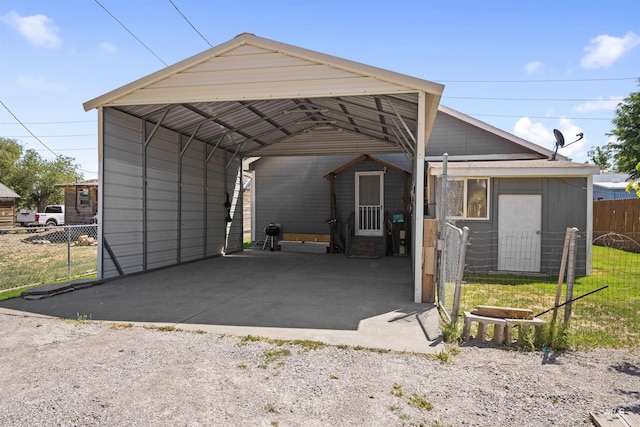 642 Oak St, Twin Falls, ID 83301 - view of vehicle parking featuring driveway, a detached carport, and entry steps