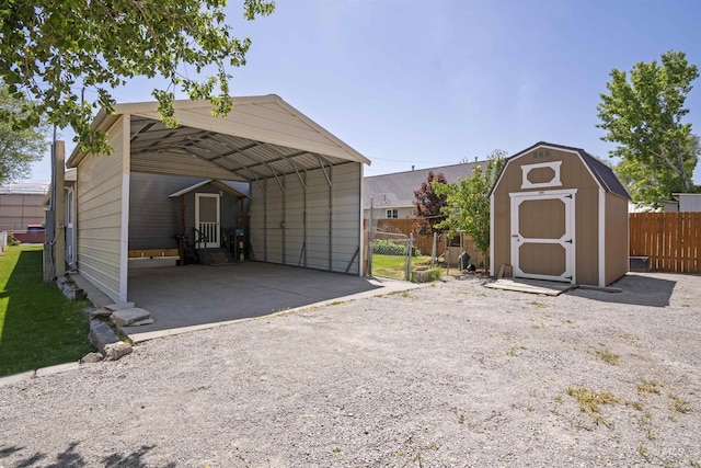642 Oak St, Twin Falls, ID 83301 - view of shed with a carport and dirt driveway