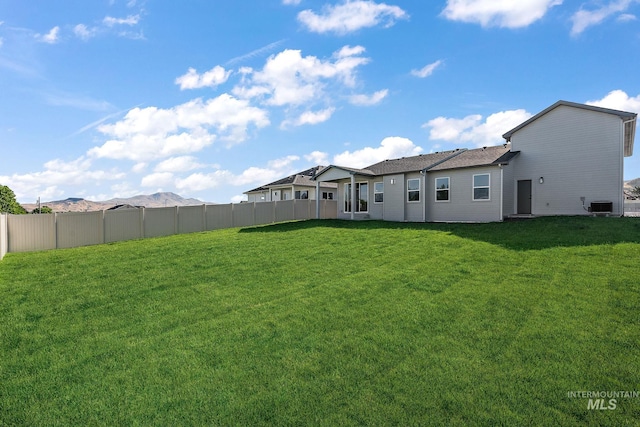 exterior space featuring central air condition unit and fence