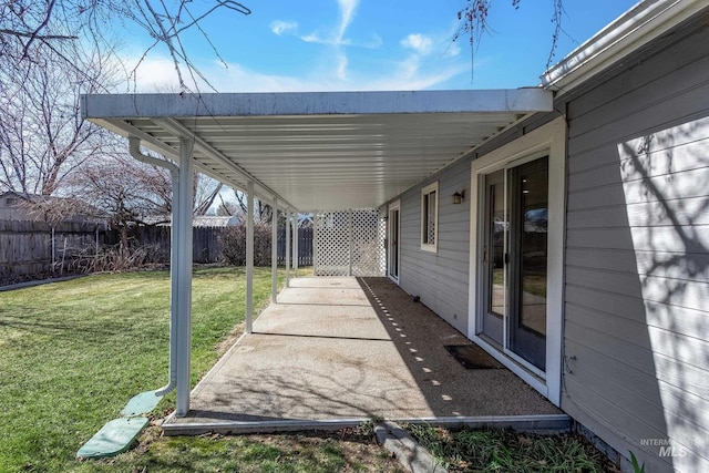 view of patio / terrace featuring fence