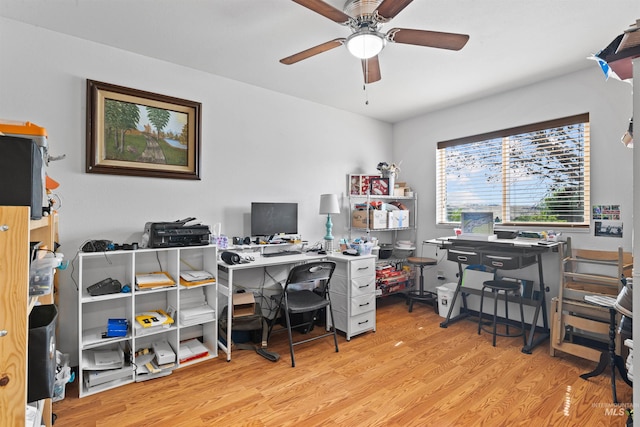 3404 Chukar Ln, Clarkston, WA 99403 - office area with a ceiling fan and wood finished floors
