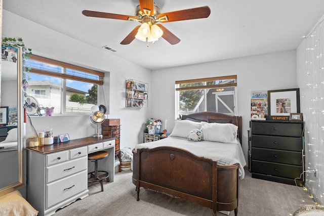 3404 Chukar Ln, Clarkston, WA 99403 - bedroom featuring light colored carpet, ceiling fan, and a desk