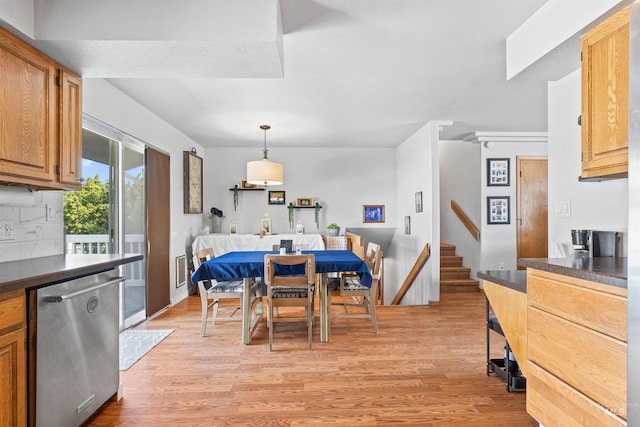 3404 Chukar Ln, Clarkston, WA 99403 - dining area with light wood-style flooring and stairs