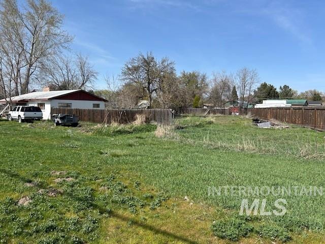 view of yard with fence