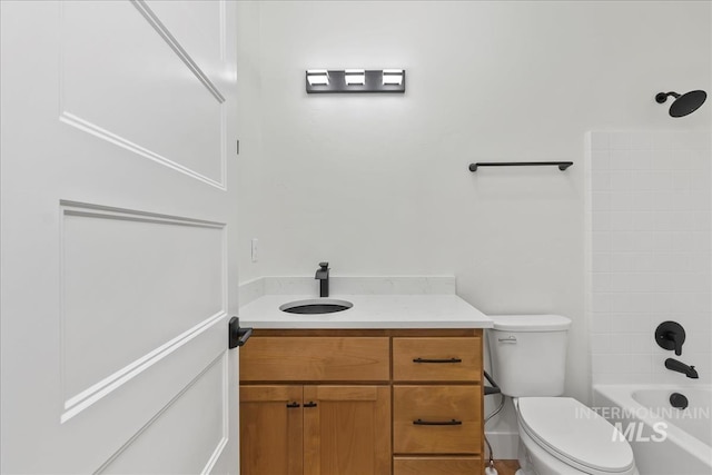 full bathroom featuring shower / tub combination, vanity, and toilet