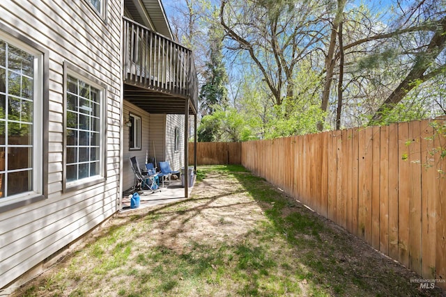 view of yard with a fenced backyard
