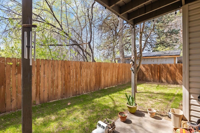 view of yard with a fenced backyard