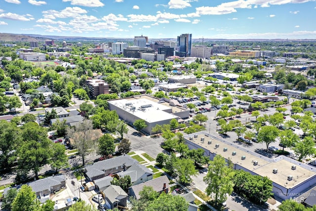 birds eye view of property featuring a city view