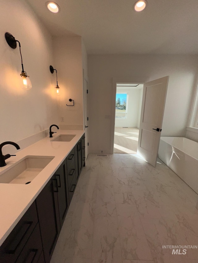 11233 S Saylis Pl, Kuna, ID 83634 - bathroom with vanity and a tub
