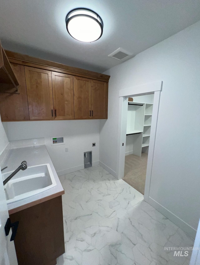 11233 S Saylis Pl, Kuna, ID 83634 - laundry area with electric dryer hookup, sink, washer hookup, and cabinets