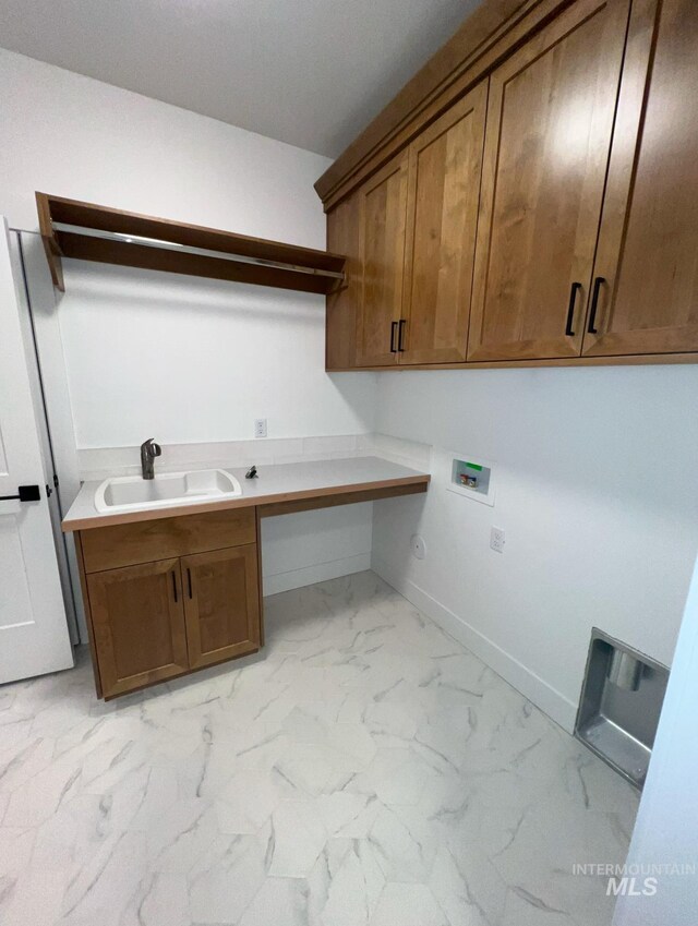 11233 S Saylis Pl, Kuna, ID 83634 - laundry room featuring washer hookup, sink, and cabinets