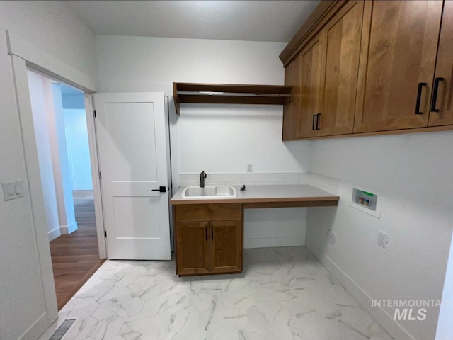 11233 S Saylis Pl, Kuna, ID 83634 - clothes washing area featuring cabinets, hookup for a washing machine, and sink