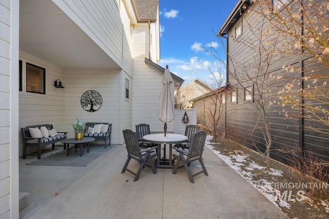 view of patio with outdoor dining space