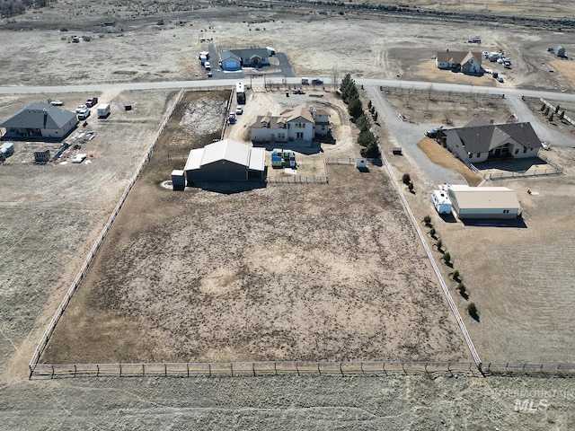 aerial view with view of desert and a rural view