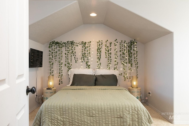 bedroom with carpet, baseboards, vaulted ceiling, and recessed lighting