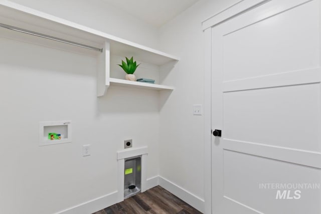 washroom featuring laundry area, baseboards, dark wood-type flooring, hookup for a washing machine, and hookup for an electric dryer