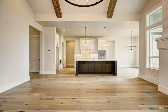 1149 E Crescendo St, Meridian, ID 83642 - kitchen featuring stainless steel oven, a chandelier, white cabinetry, recessed lighting, and plenty of natural light