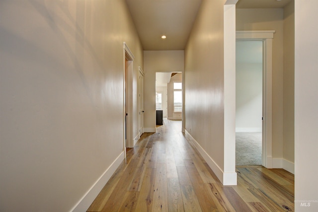 1149 E Crescendo St, Meridian, ID 83642 - hallway with light wood-style floors and recessed lighting