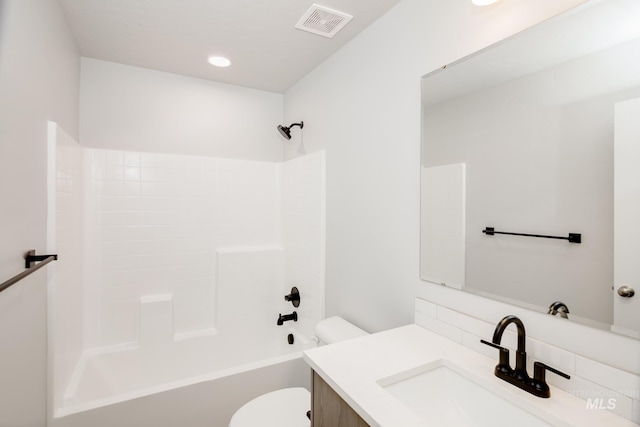 full bathroom with shower / tub combination, decorative backsplash, vanity, and toilet