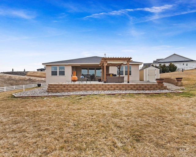 back of property with a patio, fence, a shed, a pergola, and an outdoor structure