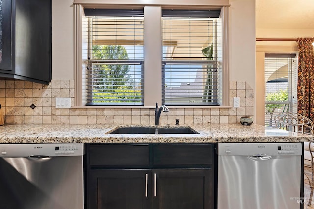 4315 N Nuova Ave, Meridian, ID 83646 - kitchen with dishwasher, tasteful backsplash, and a sink