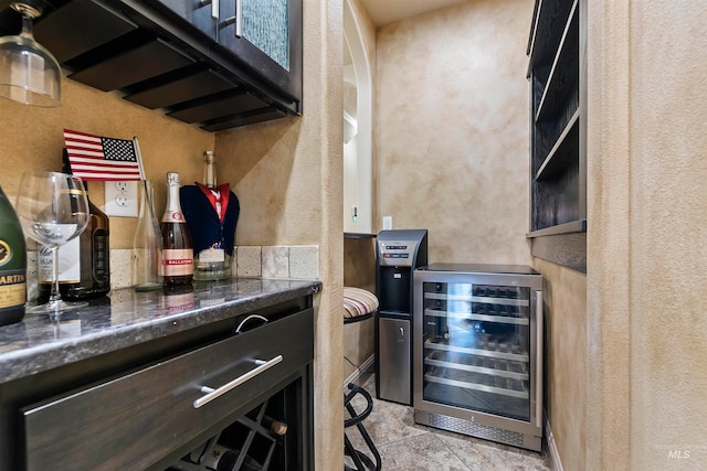 4315 N Nuova Ave, Meridian, ID 83646 - bar with beverage cooler, a textured wall, and a bar