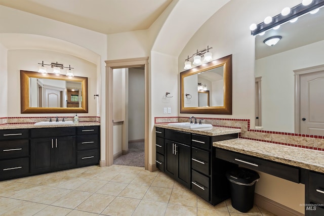 4315 N Nuova Ave, Meridian, ID 83646 - bathroom with tile patterned flooring, two vanities, and a sink