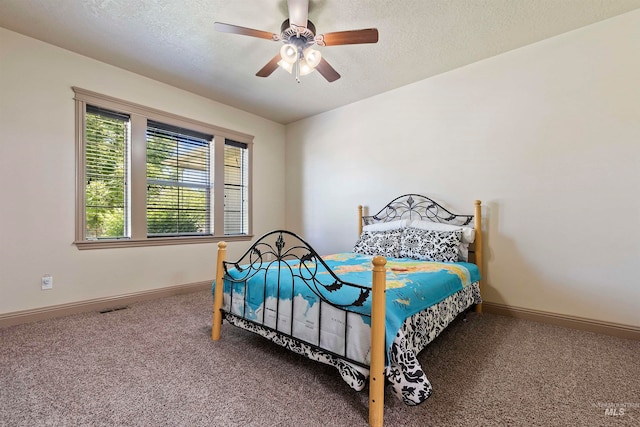 4315 N Nuova Ave, Meridian, ID 83646 - bedroom featuring a textured ceiling, carpet floors, visible vents, and baseboards