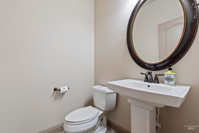 4315 N Nuova Ave, Meridian, ID 83646 - half bath featuring a baseboard heating unit, toilet, and baseboards