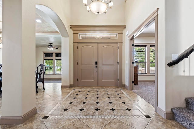4315 N Nuova Ave, Meridian, ID 83646 - entrance foyer with baseboards, stairs, and a healthy amount of sunlight