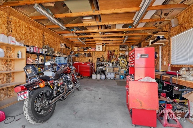 garage with a workshop area