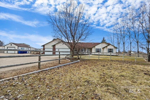 view of front of house with fence