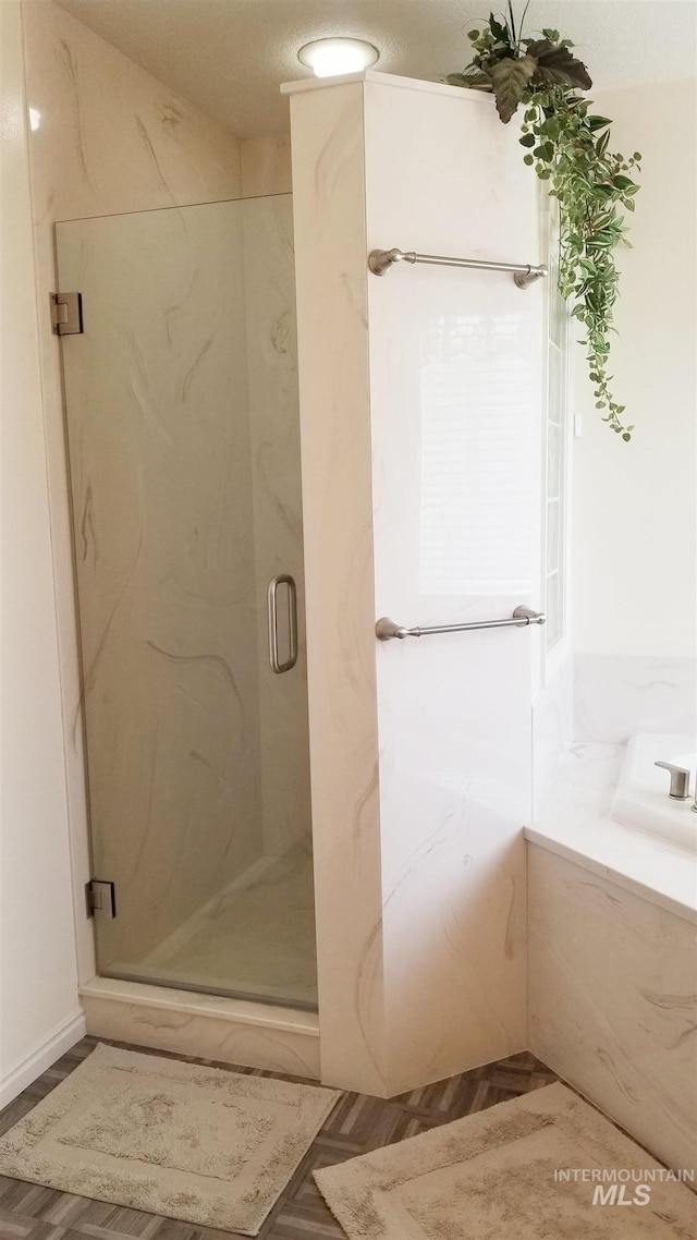 bathroom with an enclosed shower