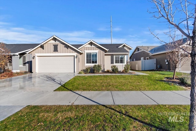 single story home with a garage and a front yard