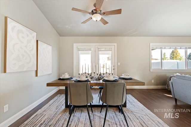 dining area featuring french doors, dark hardwood / wood-style floors, and ceiling fan