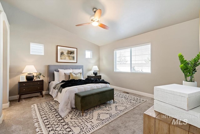 carpeted bedroom featuring ceiling fan and lofted ceiling