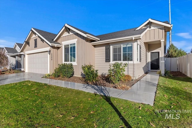 ranch-style home with a garage and a front yard