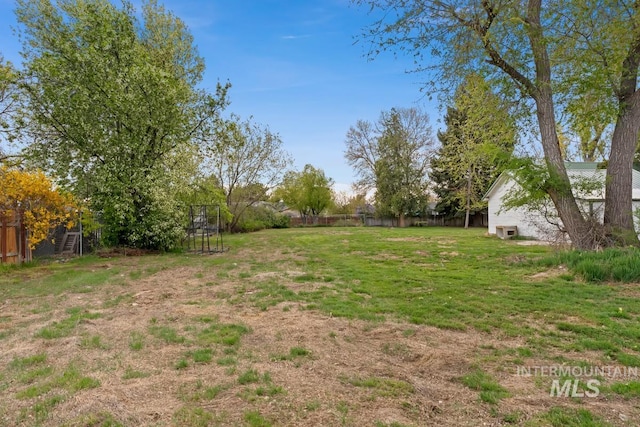 view of yard featuring fence