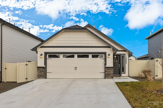 craftsman inspired home featuring a garage