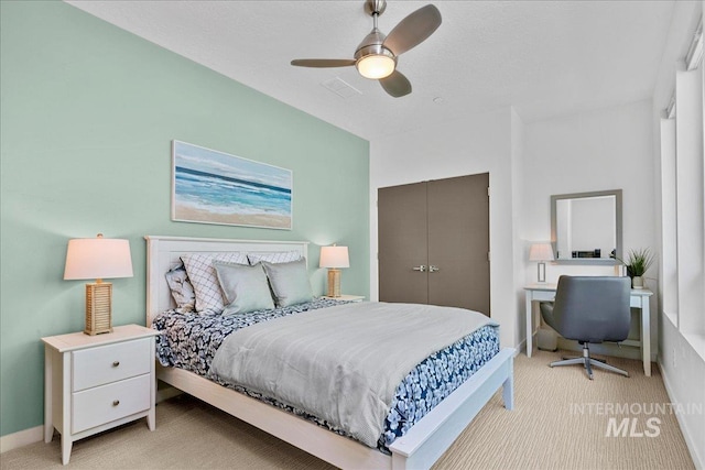 3602 N Prospect Way, Garden City, ID 83714 - bedroom with a closet, light colored carpet, ceiling fan, and baseboards