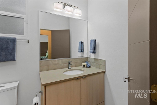 3602 N Prospect Way, Garden City, ID 83714 - bathroom with toilet and vanity