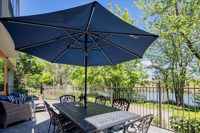 3602 N Prospect Way, Garden City, ID 83714 - view of patio / terrace with a water view, fence, outdoor dining space, and an outdoor hangout area