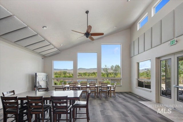 3602 N Prospect Way, Garden City, ID 83714 - dining room featuring wood finished floors, high vaulted ceiling, ceiling fan, recessed lighting, and a mountain view